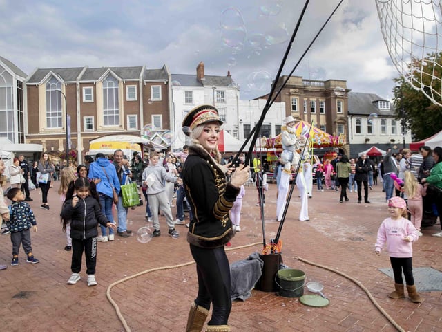 Hundreds enjoyed music, circus acts, and memories from the decade during a sixties celebration event in Northampton's Market Square on Saturday (September 24).