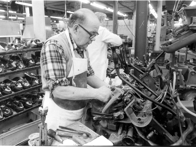 Mr Solomon in the lasting room at Church's Shoe Factory, date unknown
