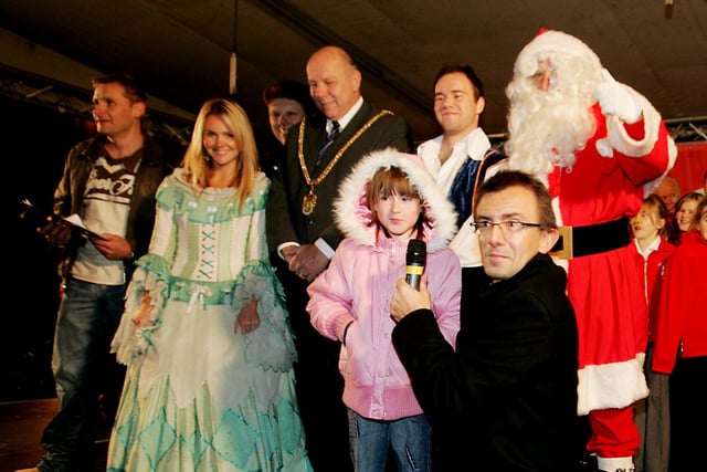 Father Christmas, DJ Bernie Keith, DJ Woody Northants 96, Stars of Dick Whittington, Mayor Colin Lill and Jessica Mullen ready for the lights switch-on in 2006.