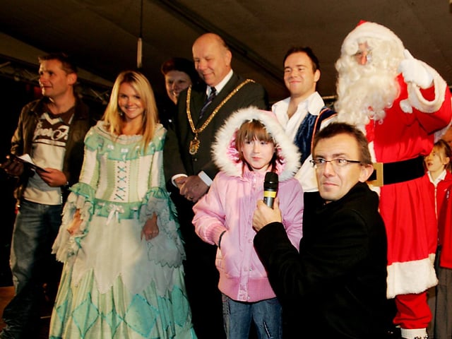 Father Christmas, DJ Bernie Keith, DJ Woody Northants 96, Stars of Dick Whittington, Mayor Colin Lill and Jessica Mullen ready for the lights switch-on in 2006.