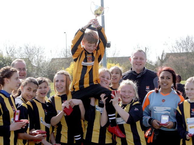 Parkland Tigers celebrate winning the Raunds NFA U14 girls Invitation Cup in April 2012.