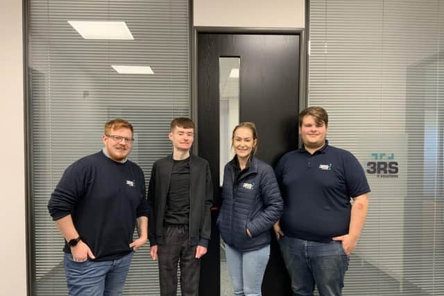Stephen Souch is pictured with Cullen from Teamwork Trust, Leila Souch and Ethan Malvern