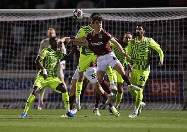 Ben Perry contests for the ball during the Sky Bet League One match between Northampton Town FC and Rotherham United FC at Sixfields on April 01, 2025 in Northampton, England. (Photo by Pete Norton/Getty Images)