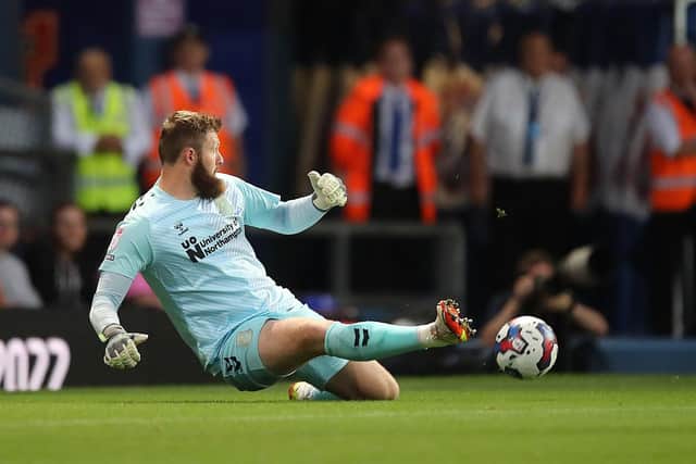 Cobblers goalkeeper Jonny Maxted is beaten for one of Ipswich Town's six goals at Portman Road (Pictures: Pete Norton)
