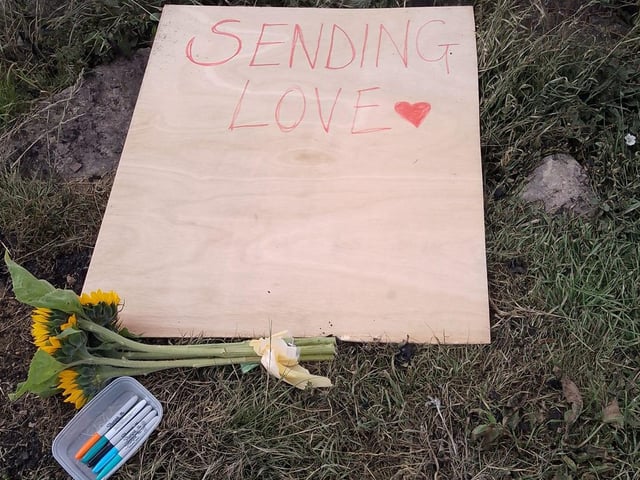 The wooden board pictured at the scene yesterday.