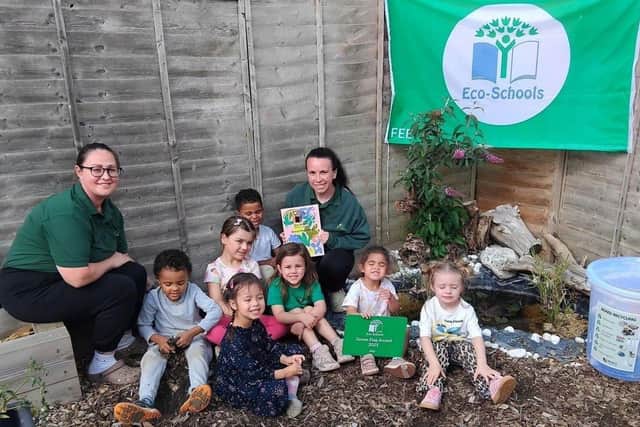 Acorn team and children