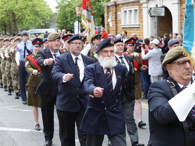 Kettering town centre: crowds line town centre to welcome The Royal Anglian Regiment for Armed Forces Day parade /National World