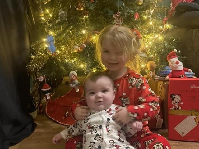 Noahs’s first christmas with his big sister Eliza.