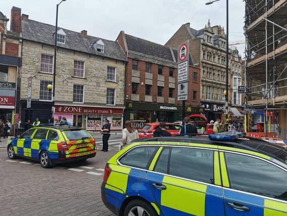 The scene in Northampton town centre today (Tuesday) as police and bomb squad units deal with "suspicious object" found in doorway near Market Square