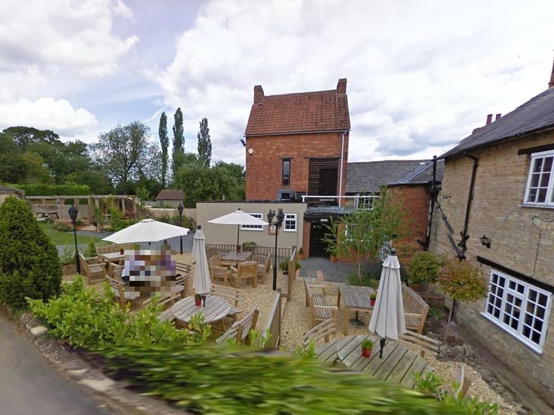 The village pub offers plenty of outside seating for drinks and food.