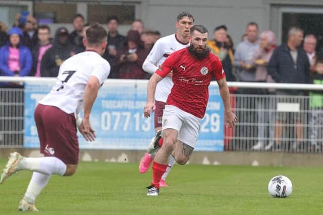 Striker Danny Newton on the attack for Brackley Town against the Cobblers on Saturday (Picture: Pete Norton/Getty Images)
