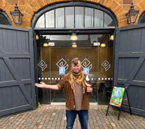 Artist Jonathan Reynolds outside the Coachhouse at Delapre