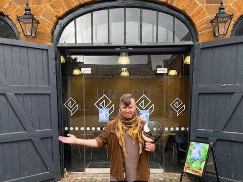 Artist Jonathan Reynolds outside the Coachhouse at Delapre