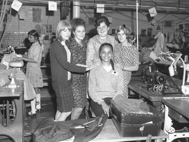 Looking Back old glass negs September 15, 1966 Anita Neil, Wellingborough, in clothing factory by Singer sewing machine