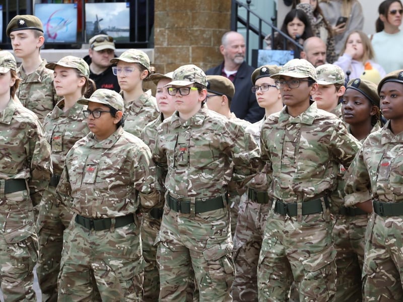 Kettering town centre: crowds line town centre to welcome The Royal Anglian Regiment for Armed Forces Day parade /National World