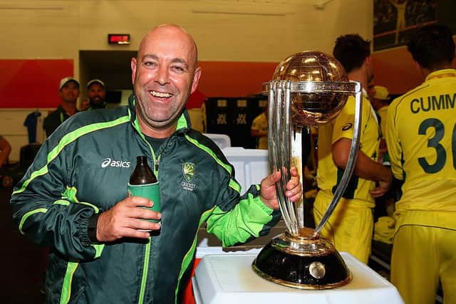 Darren Lehmann pictured with the World Cup after coaching Australia to victory in 2015