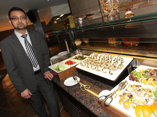 Sourabh Kohli, manager at Fusion Restaurant on Wellingborough Road, showing off some of their dishes in 2010