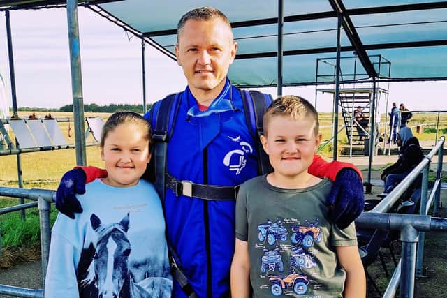 Piotr Maciaszek and his two children, Emily and Simon.