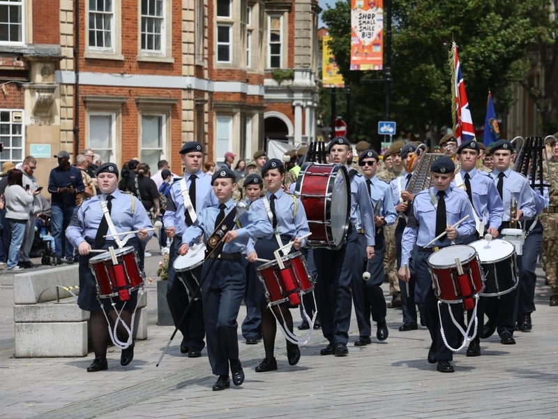 Kettering town centre: crowds line town centre to welcome The Royal Anglian Regiment for Armed Forces Day parade /National World
