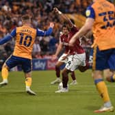 Ali Koiki scores the Cobblers goal at Mansfield