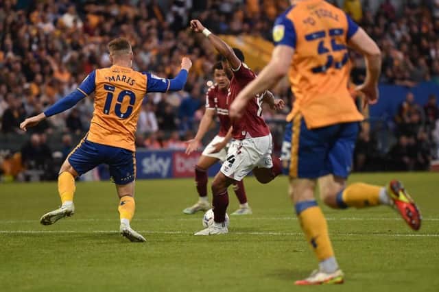 Ali Koiki scores the Cobblers goal at Mansfield