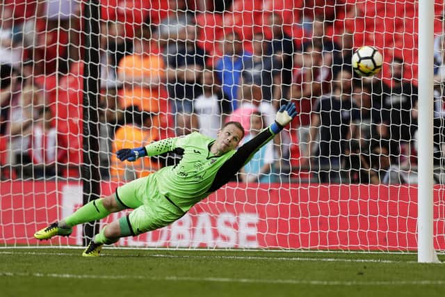 Danny Lewis (photo by Henry Browne/Getty Images)