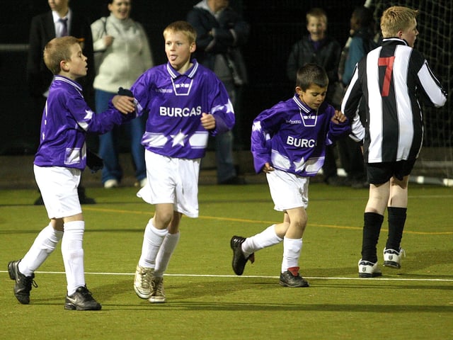 A football tournament at Unity College, organised by Northampton School Sports Partnership. Football action from Lyncrest Primary School (purple), V Vernon Terrace Primary School (black and white).