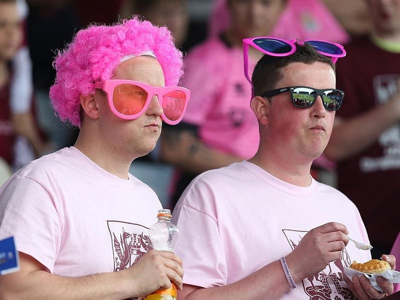 Northampton Town fans wear pink for the last game of the season prior to the Sky Bet League Two match between Portsmouth and Northampton Town at Fratton Park on May 7, 2016.