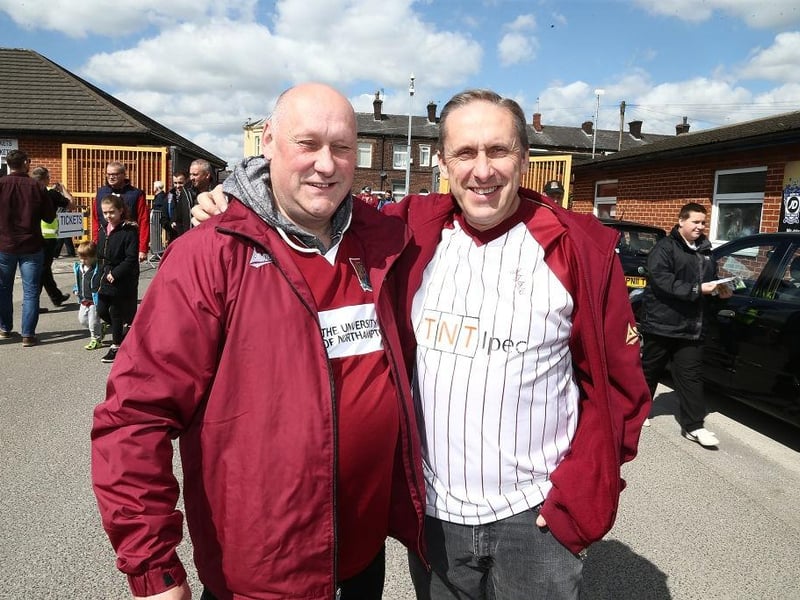 Northampton Town fans attend the game in old shirts from previous seasons during the Sky Bet League One match between Bury and Northampton Town at Gigg Lane on April 22, 2017.