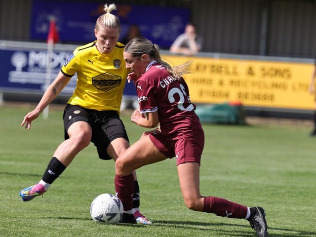 Laila Channell holds off the challenge from Evie Brooks