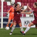 Jade Bell celebrates with Zoe Boote after scoring her third and Northampton's fourth against Sutton Coldfield. (Photo by Pete Norton/Getty Images)