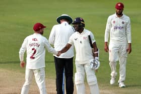 Kent's Daniel Bell-Drummond is congratulated by Northants skipper Luke Procter at the close of play on day two at the County Ground - Bell-Drummond is 271 not out (Picture: David Rogers/Getty Images)
