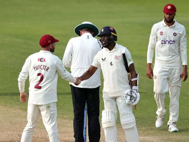 Kent's Daniel Bell-Drummond is congratulated by Northants skipper Luke Procter at the close of play on day two at the County Ground - Bell-Drummond is 271 not out (Picture: David Rogers/Getty Images)