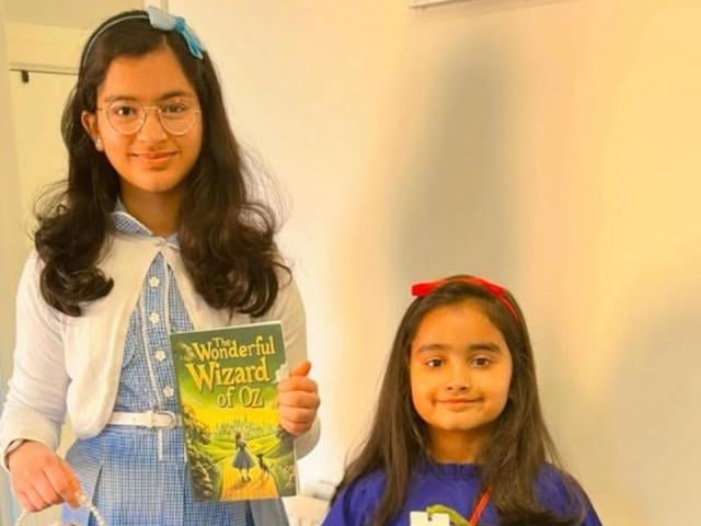 Abbie, aged 10, as Dorothy and Anaisha, aged five, as Matilda.