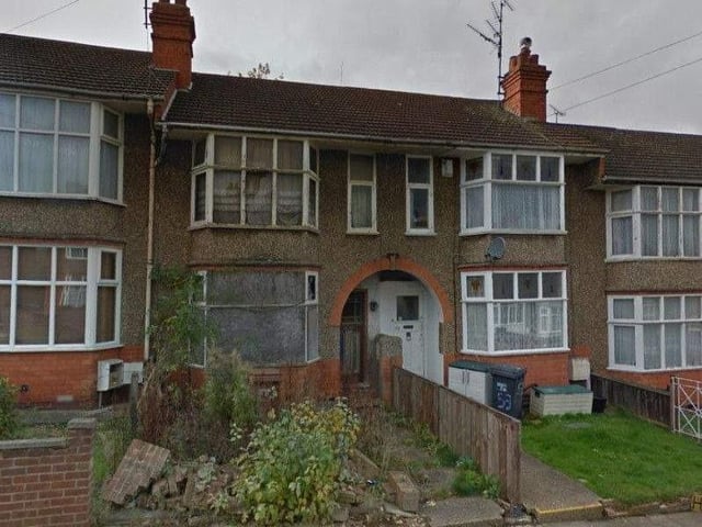 Northampton resident David Nicholls is calling on West Northamptonshire Council (WNC) to bring the 'rat-infested' property next door to him in Murray Avenue 'back in to use'.
The house has boarded up doors and windows, a ruined garden wall and the front garden is a state - no one knows what the inside is like but David believes it is full of rats and vermin. Since moving to the area in 2008, David said the house has been in the exact same rundown state.