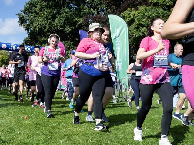 Walkers, runners and joggers completed two laps of Abington Park for the 10k Race for Life on Sunday (July 14).