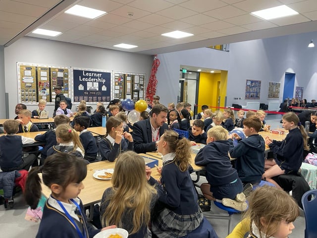 Mike Reader MP joins Wootton Park School pupils as they enjoy their first free breakfast meal