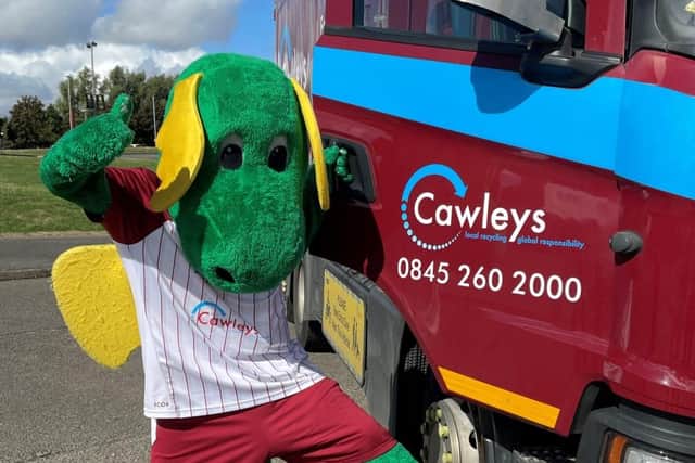 Clarence the Mascot pictured with a Cawleys dustcart.