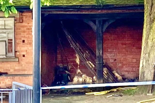 Some of the damage to the building in Abington Park.