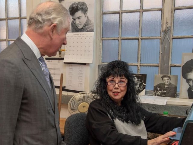 The Prince speaks to Heather Haddon as he visits shoemakers Tricker’s factory in 2019
