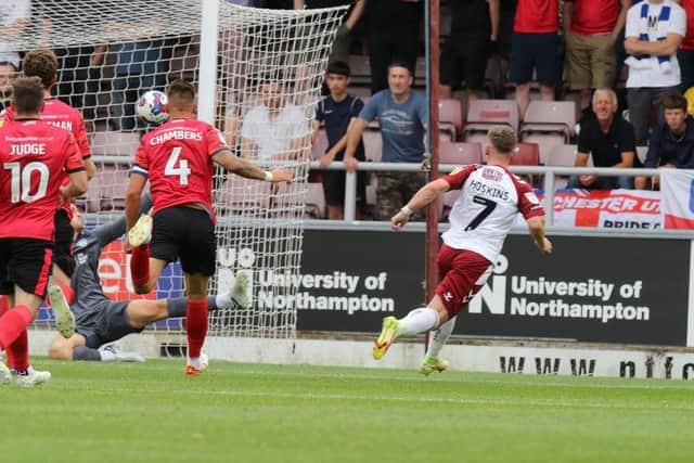 Sam Hoskins blasts Cobblers into a first-half lead after being superbly set up by Danny Hylton. Picture: Pete Norton.