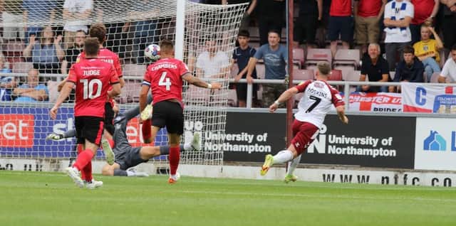 Sam Hoskins blasts Cobblers into a first-half lead after being superbly set up by Danny Hylton. Picture: Pete Norton.
