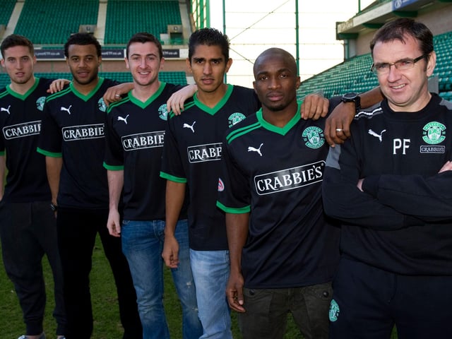 One of these players moved for more than £14million. No Hibs fan would have paid £14 for any of those featured. Pat Fenlon is standing with Matt Doherty (the £14m+ player), Tom Soares, Roy O' Donovan, Jorge Claros and Pa Kujabi.