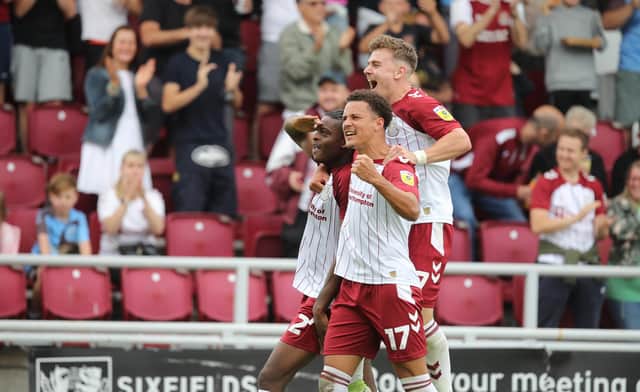 Tyler Magloire's header made it 3-1 and gave Cobblers breathing space. Pictures: Pete Norton.
