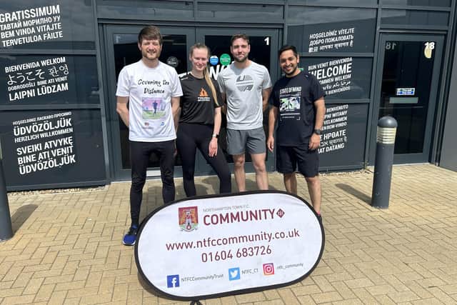 Damon Fox, pictured with Ellie Smith, Adam Steel and Inder Prakash from Decathlon, ahead of a five kilometre run to get him closer to the finish line.