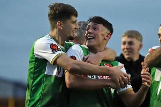 Frankie Maguire (right) was all smiles after netting the third goal in Kettering Town's 3-0 win at Banbury United