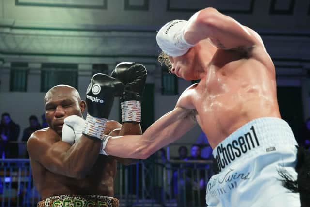 Carl Fail connects with Serge Ambomo during his super welterweight win on Friday night
