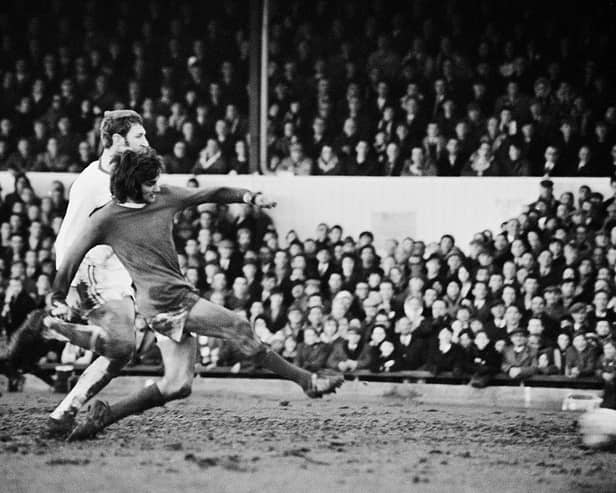 Manchester United player George Best scores against Northampton Town on 7th February 1970.