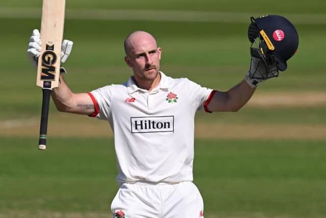 Lancashire's Josh Bohannon celebrates reaching his century against Northants at the County Ground (Picture; Shaun Botterill/Getty Images)