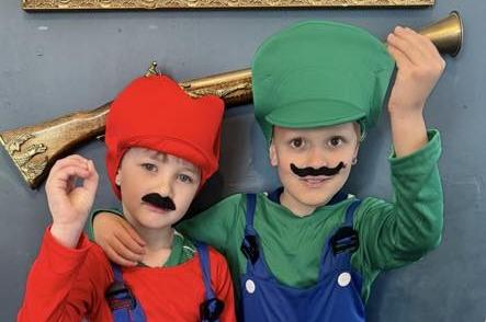 Marley, aged seven, and Eli, aged six, as the Mario Bros.